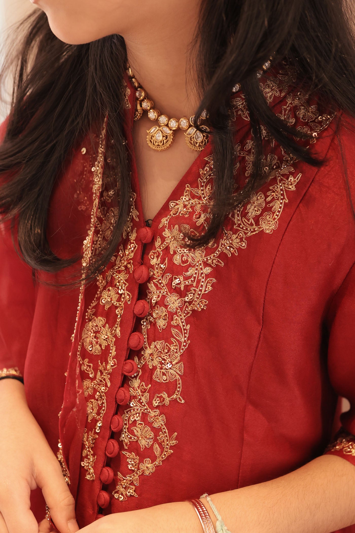 Maroon silk kurta set with intricate borders