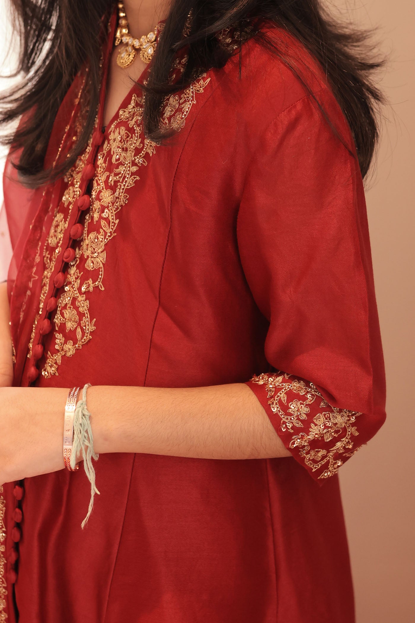 Maroon silk kurta set with intricate borders