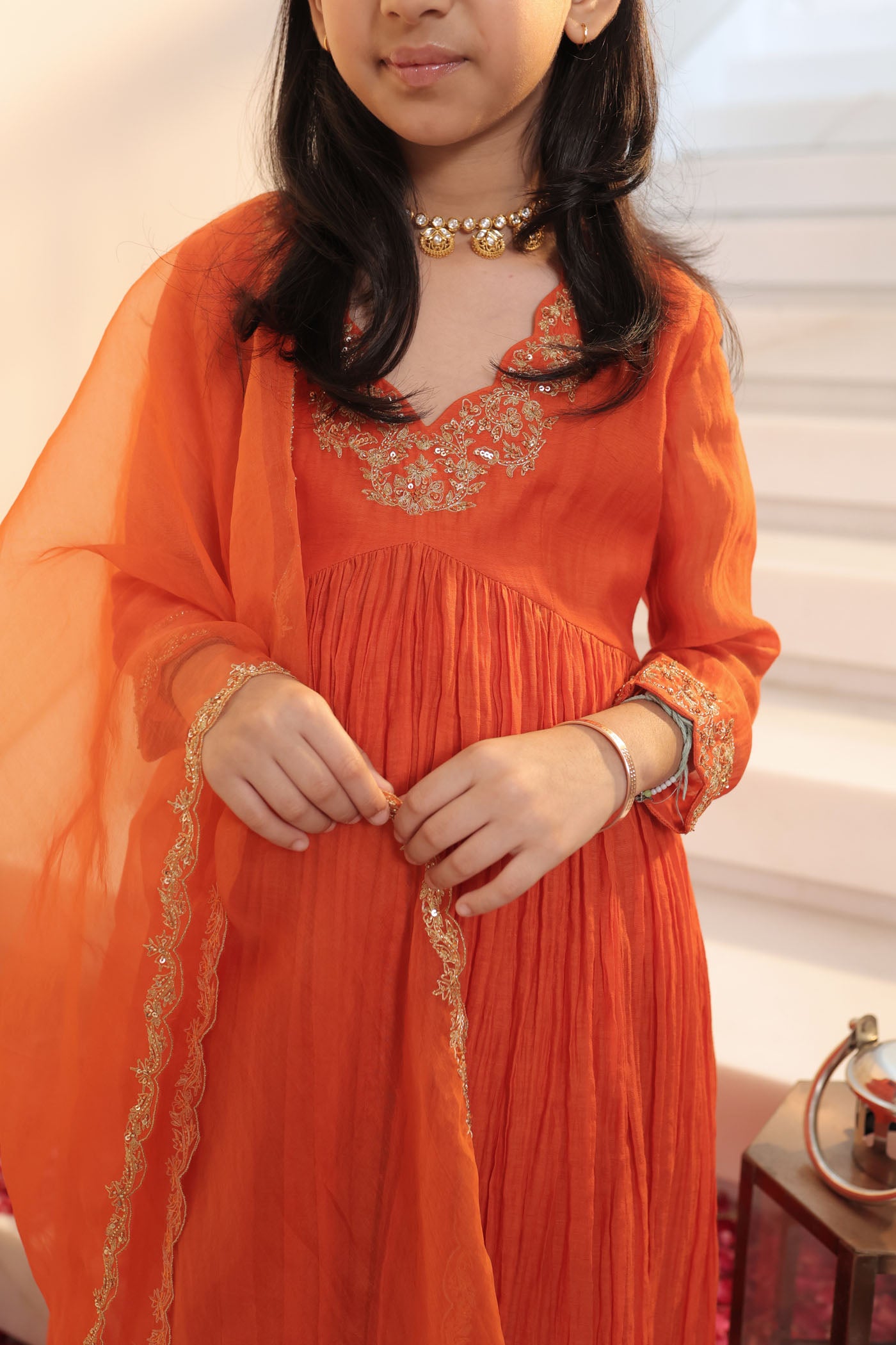 Tangerine micro pleated anarkali set with fine golden zari embroidery