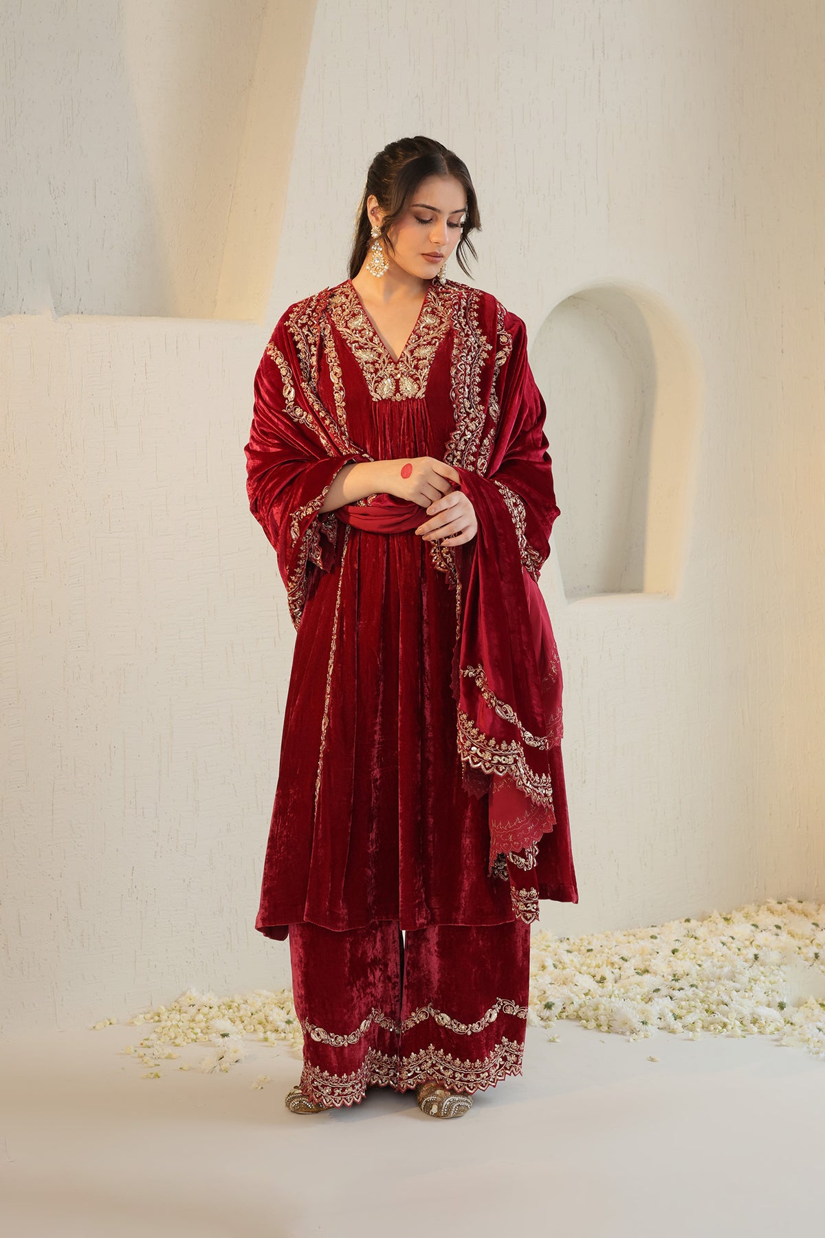 Deeply maroom velvet suit set will gold embroidery and detailed dupatta