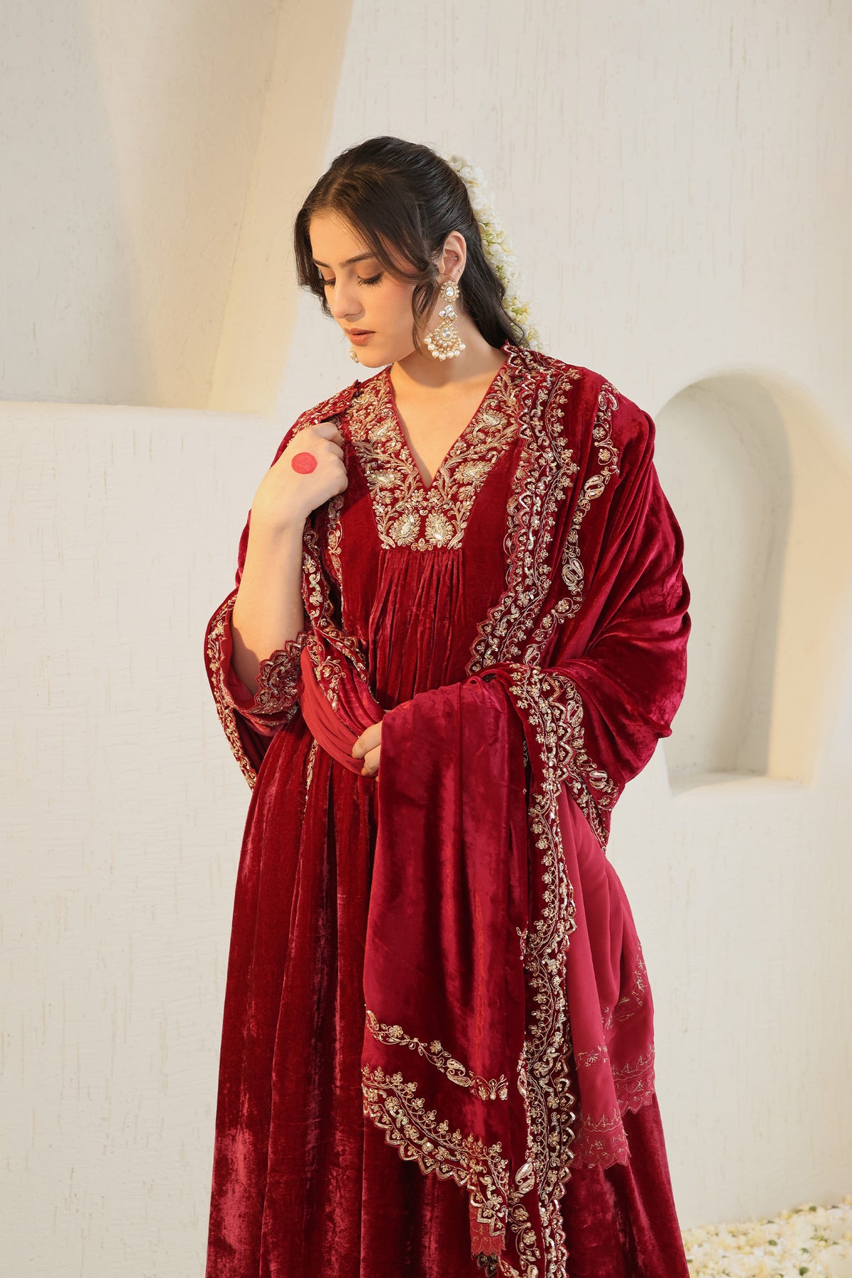 Deeply maroom velvet suit set will gold embroidery and detailed dupatta