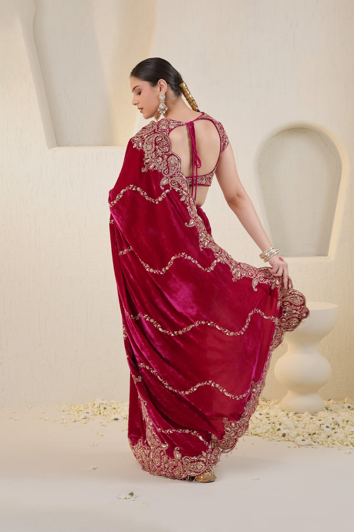 Hot pink velvet saree with gold embroidery