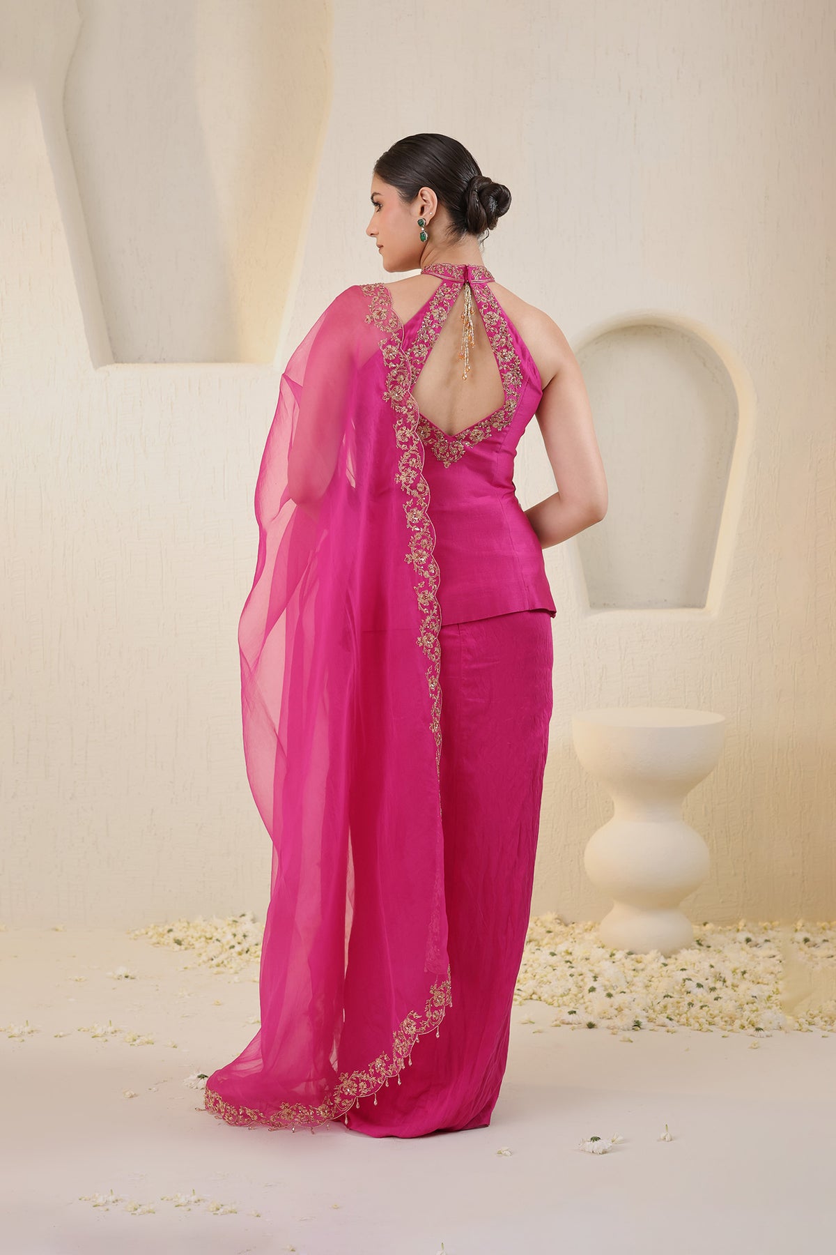 Fushia pink halter neck silk ensemble with embroidered dupatta