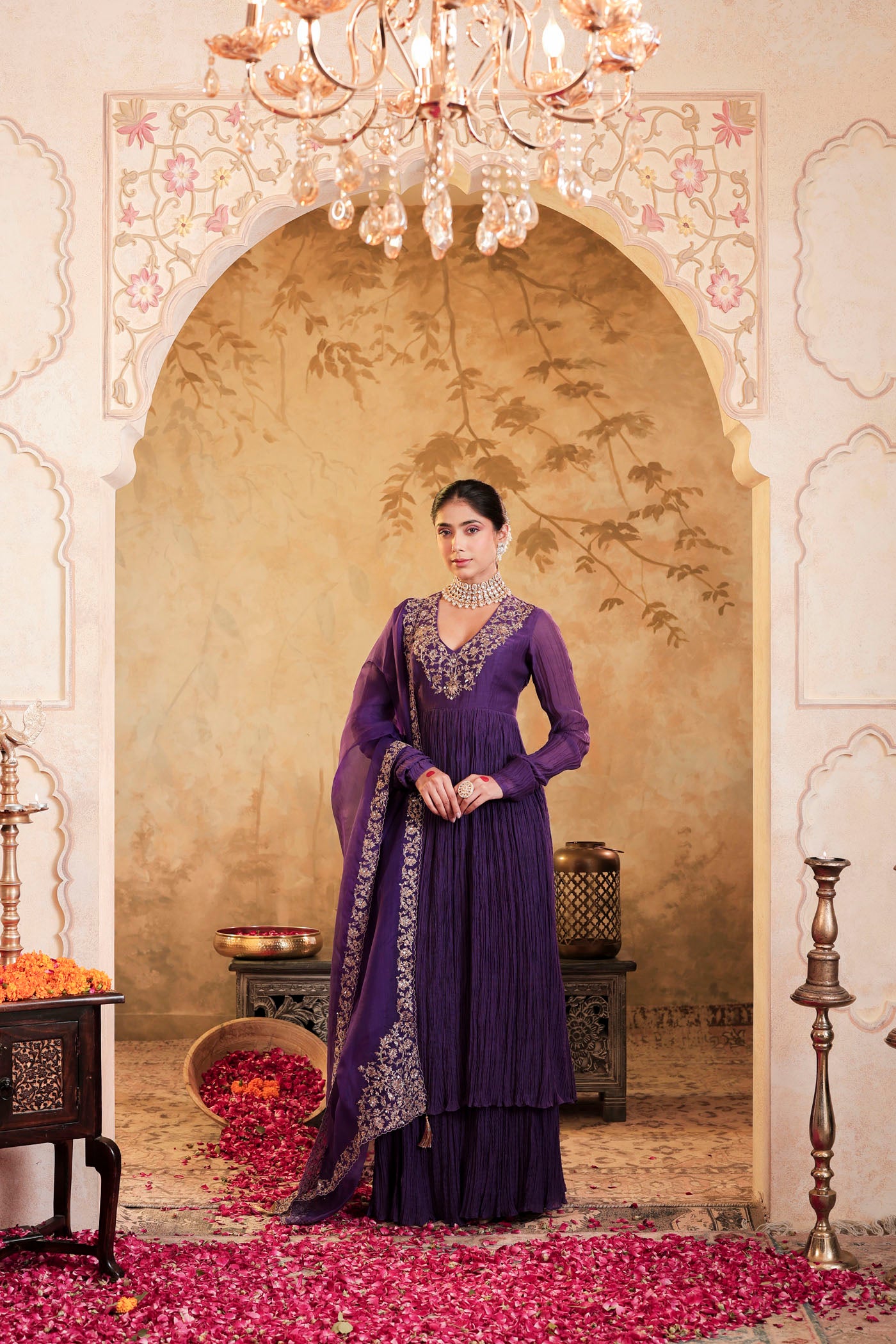 Royal purple anarkali woven with golden dreams
