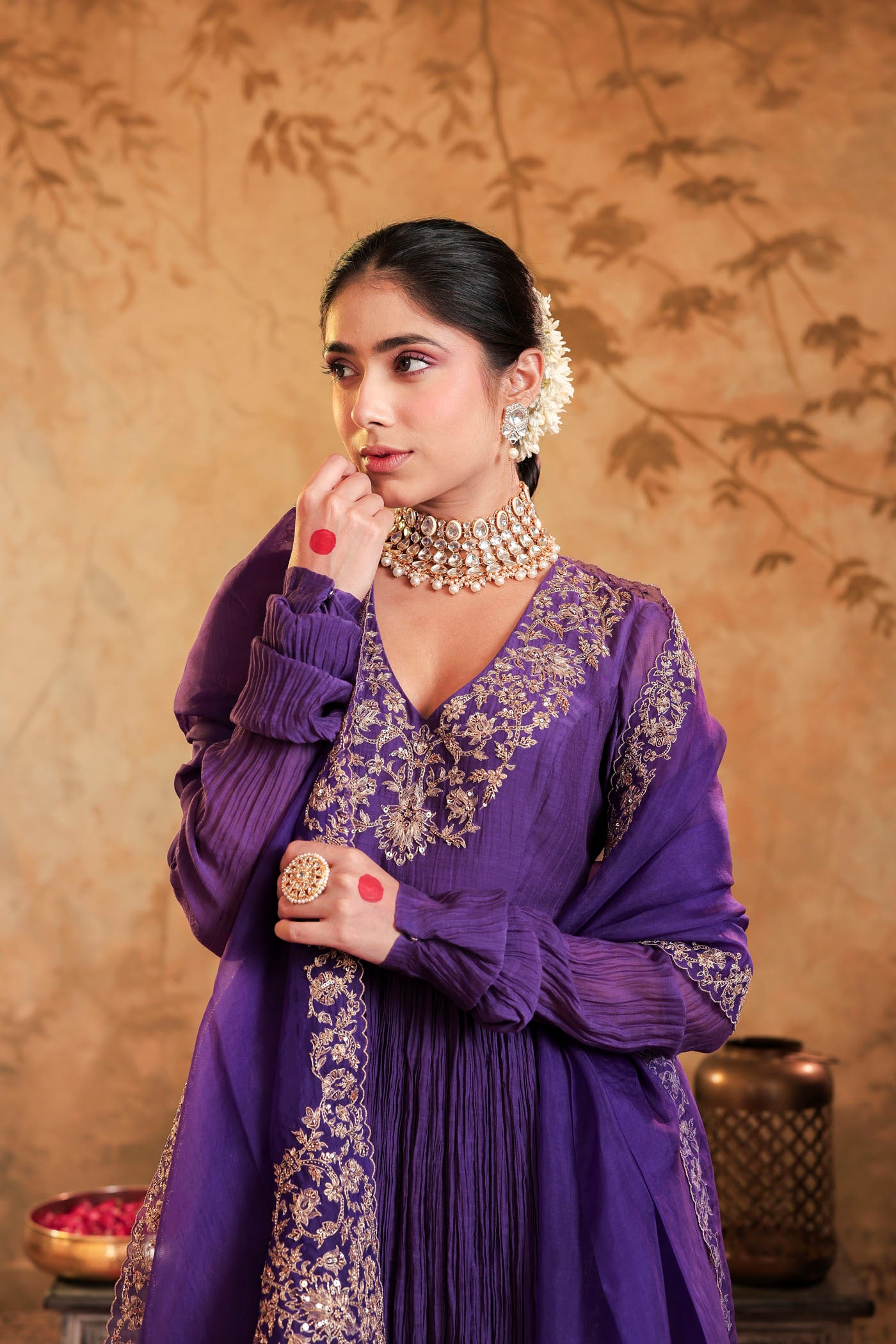 Royal purple anarkali woven with golden dreams