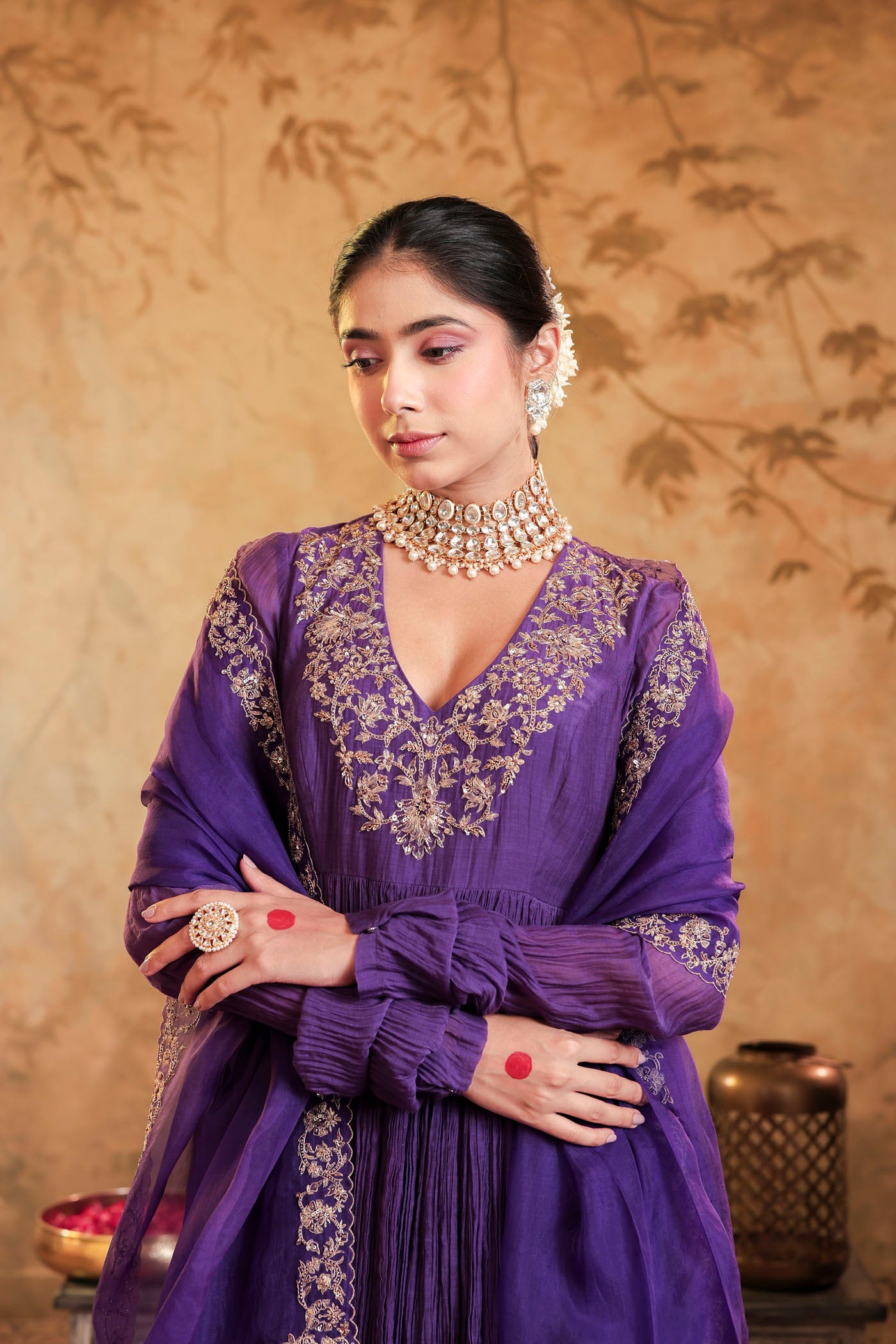 Royal purple anarkali woven with golden dreams