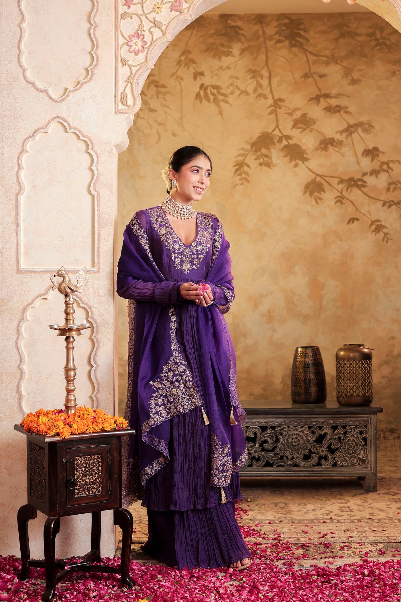 Royal purple anarkali woven with golden dreams
