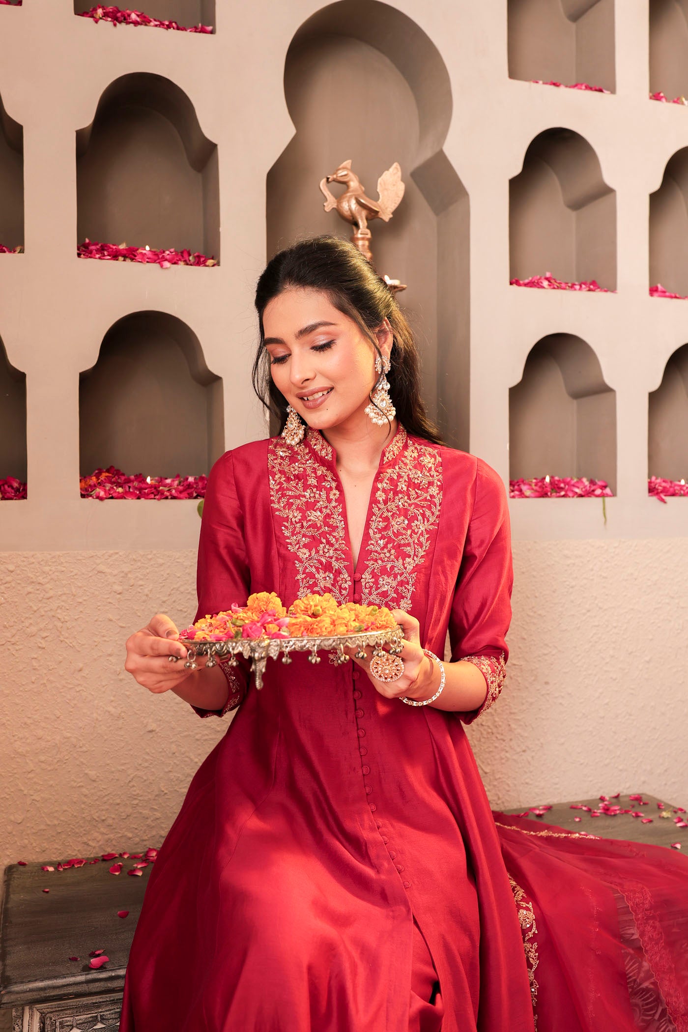 Maroon silk kurta set with intricate borders