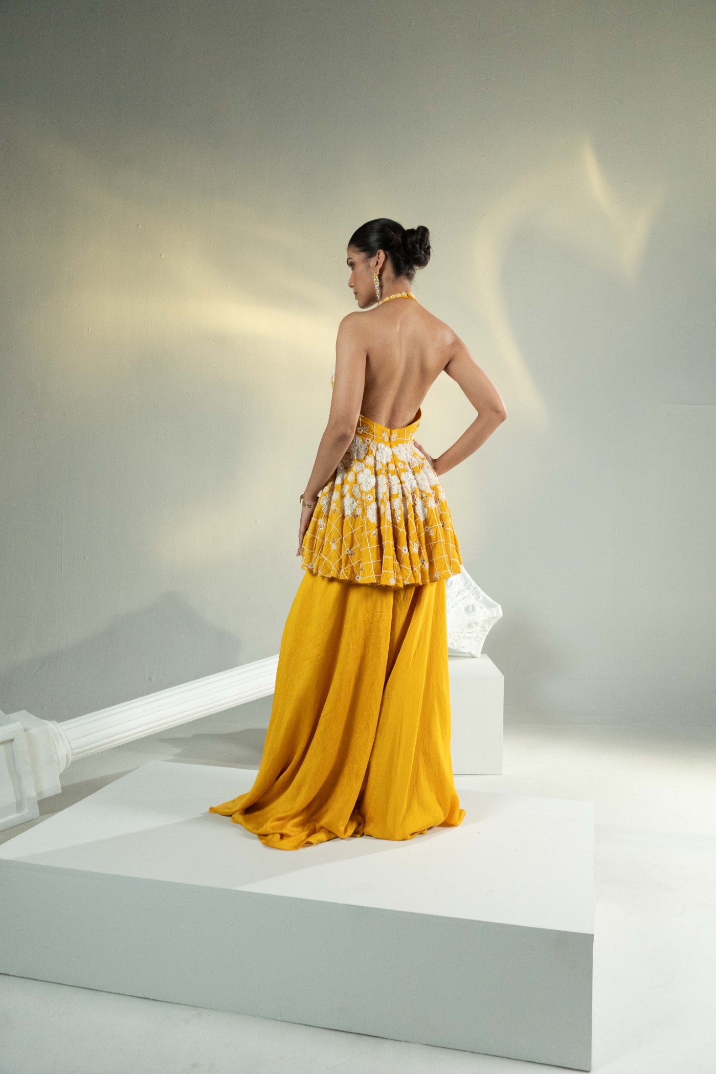 Sakshi Sindhwani in Soleil Halter Charm Sharara