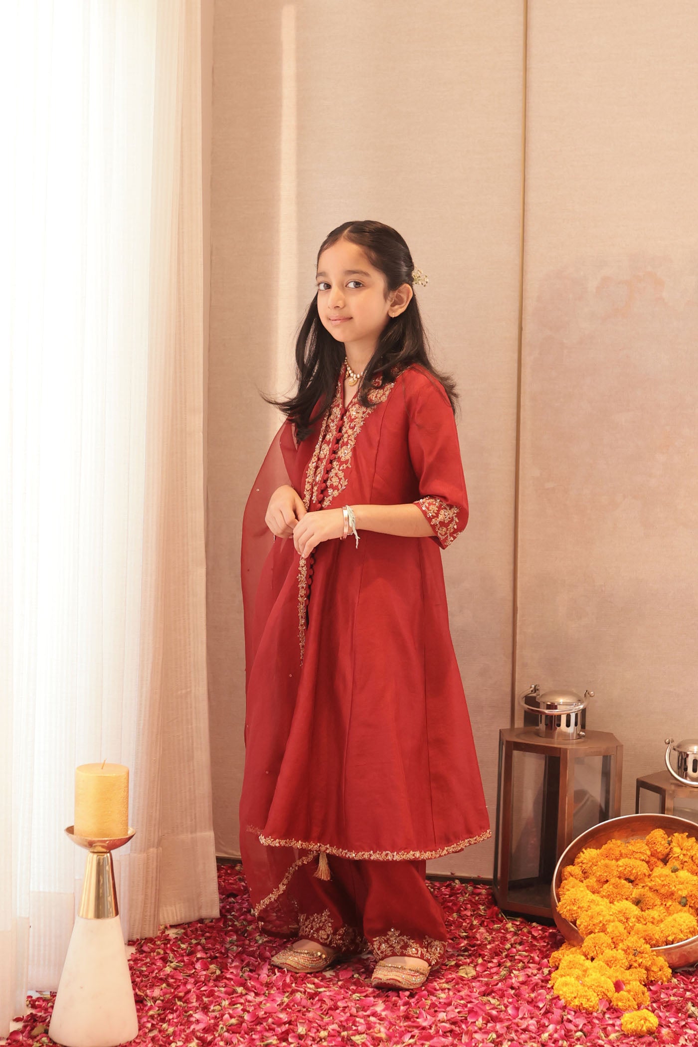 Maroon silk kurta set with intricate borders