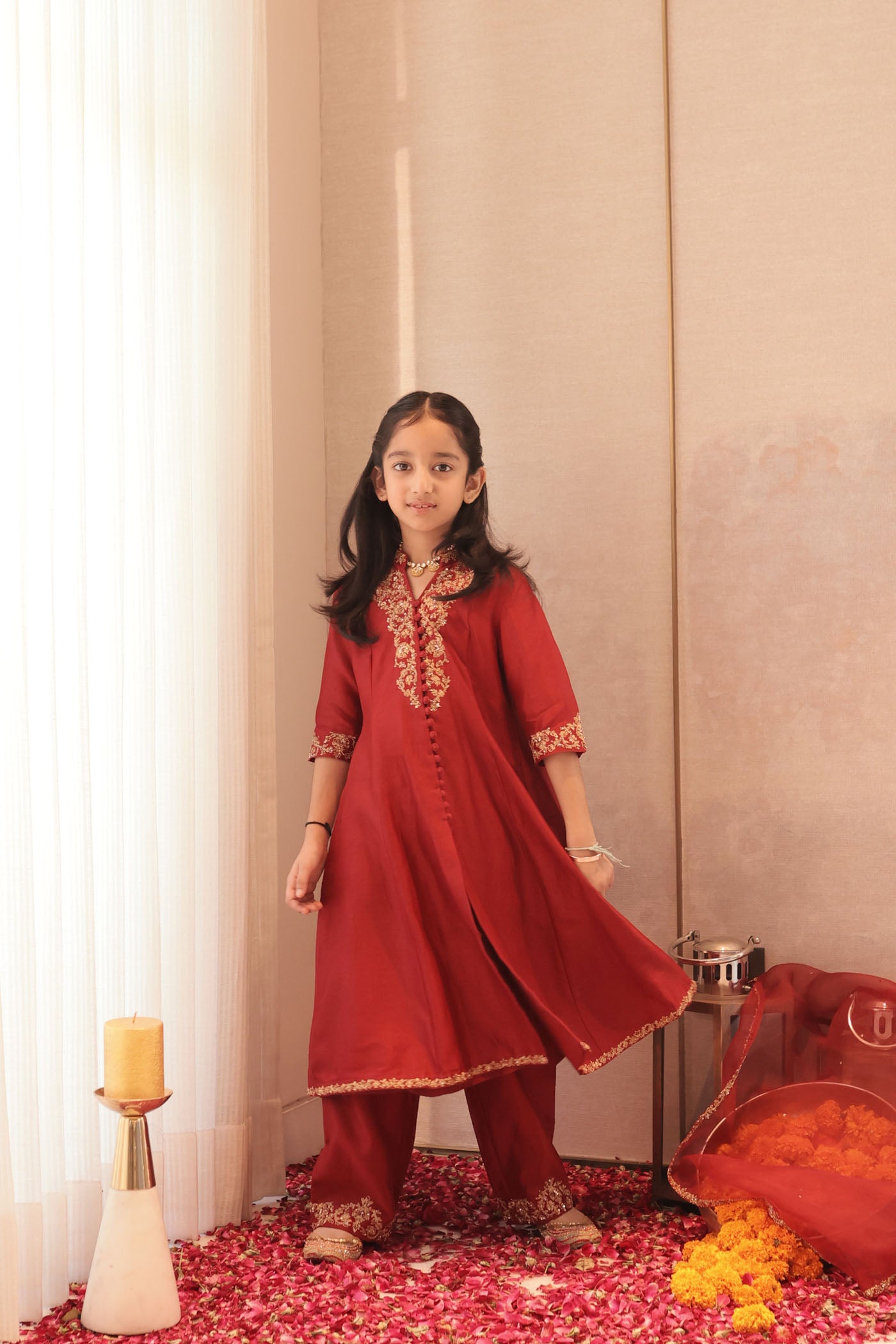 Maroon silk kurta set with intricate borders
