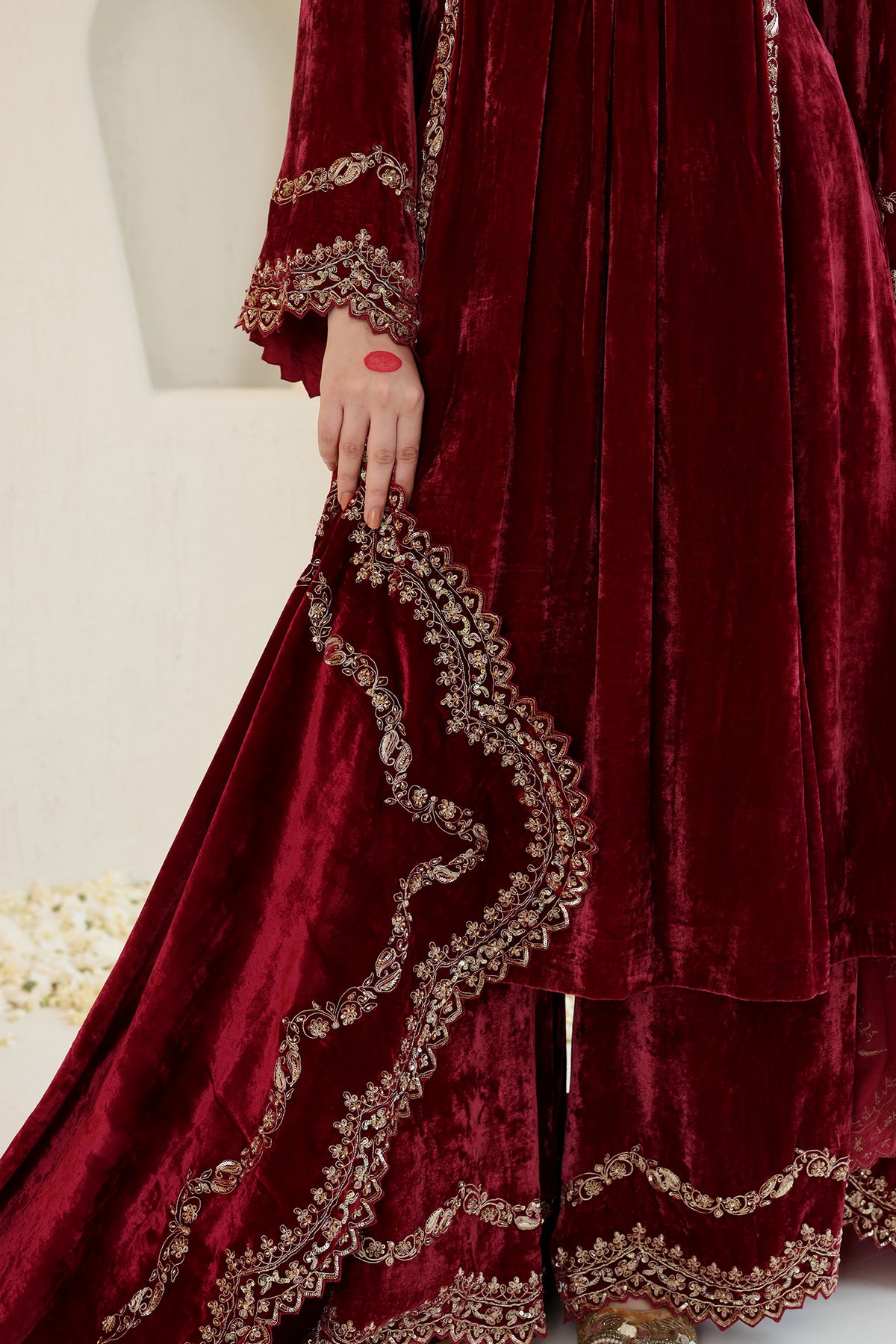 Deeply maroom velvet suit set will gold embroidery and detailed dupatta