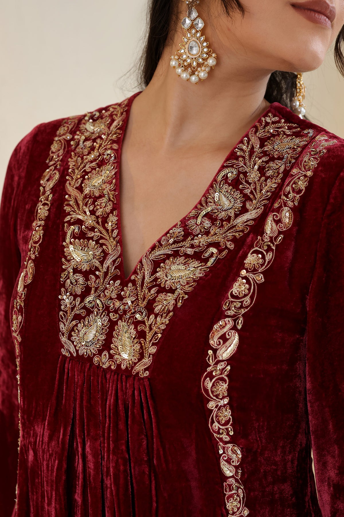 Deeply maroom velvet suit set will gold embroidery and detailed dupatta