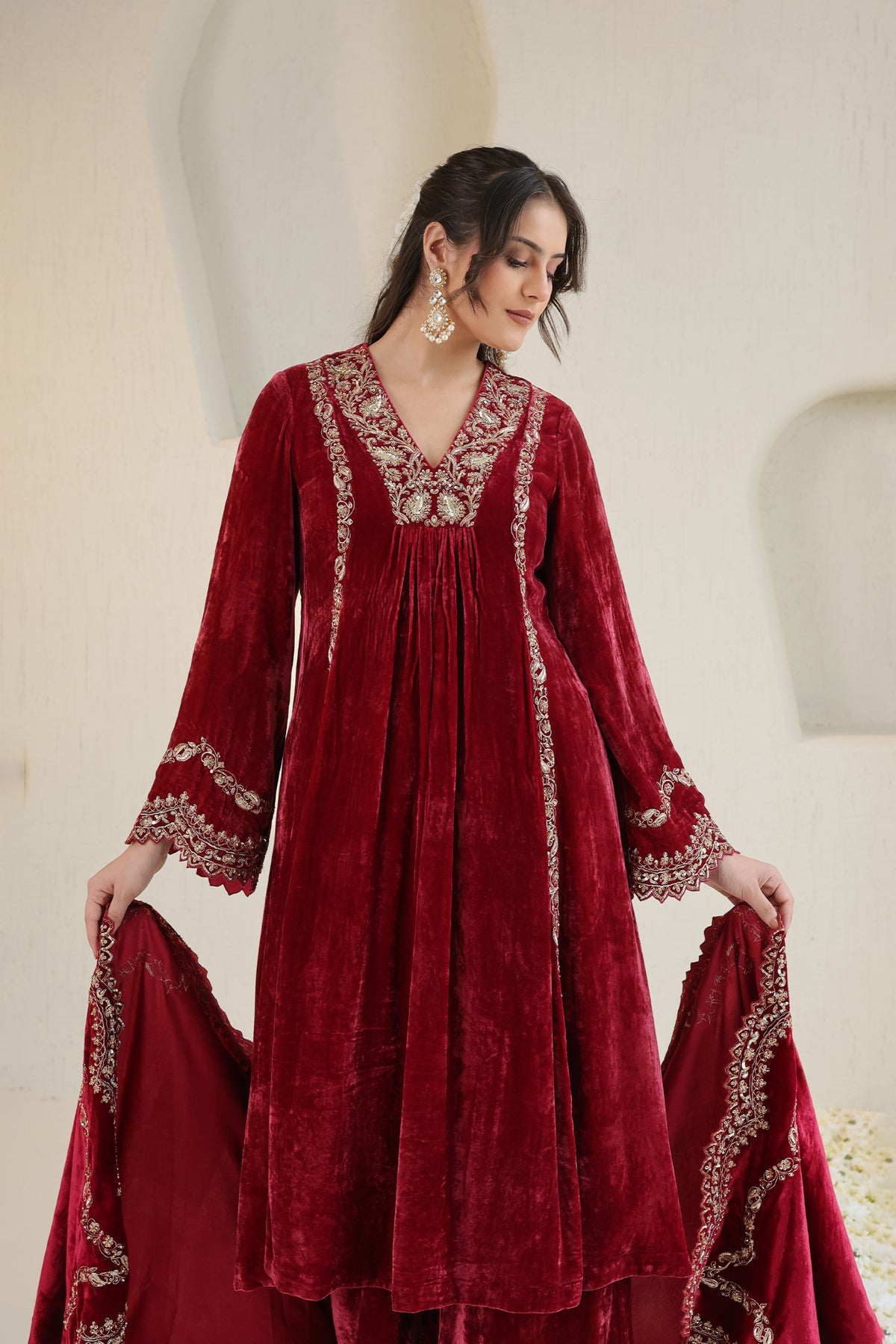 Deeply maroom velvet suit set will gold embroidery and detailed dupatta