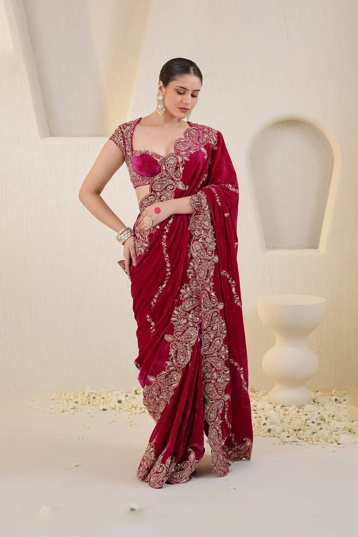 Hot pink velvet saree with gold embroidery
