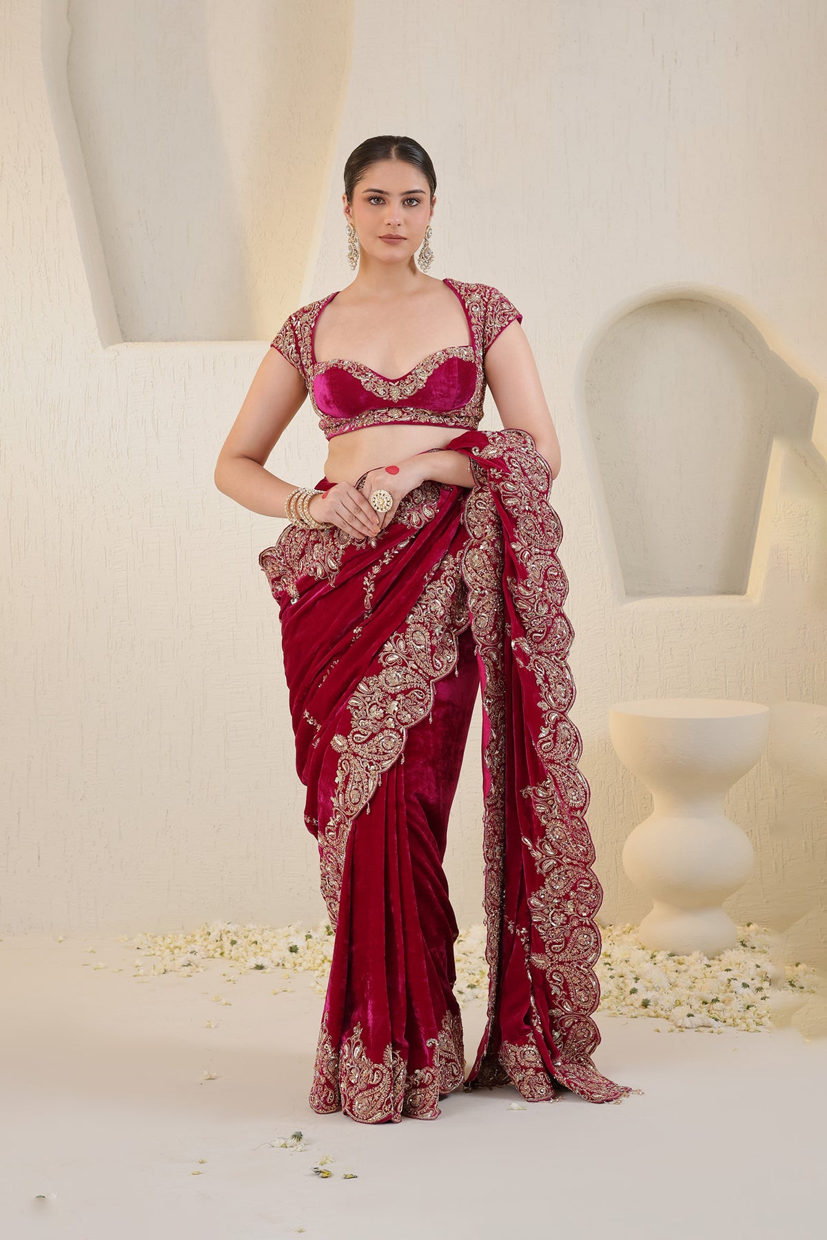 Hot pink velvet saree with gold embroidery