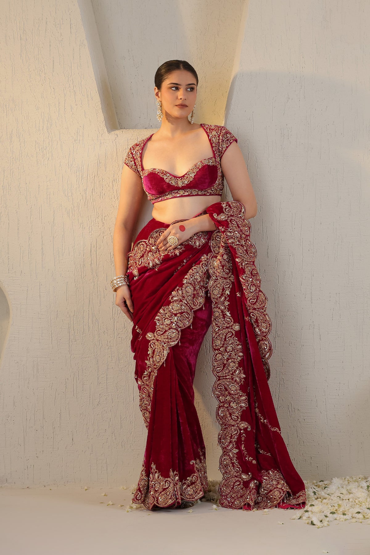 Hot pink velvet saree with gold embroidery