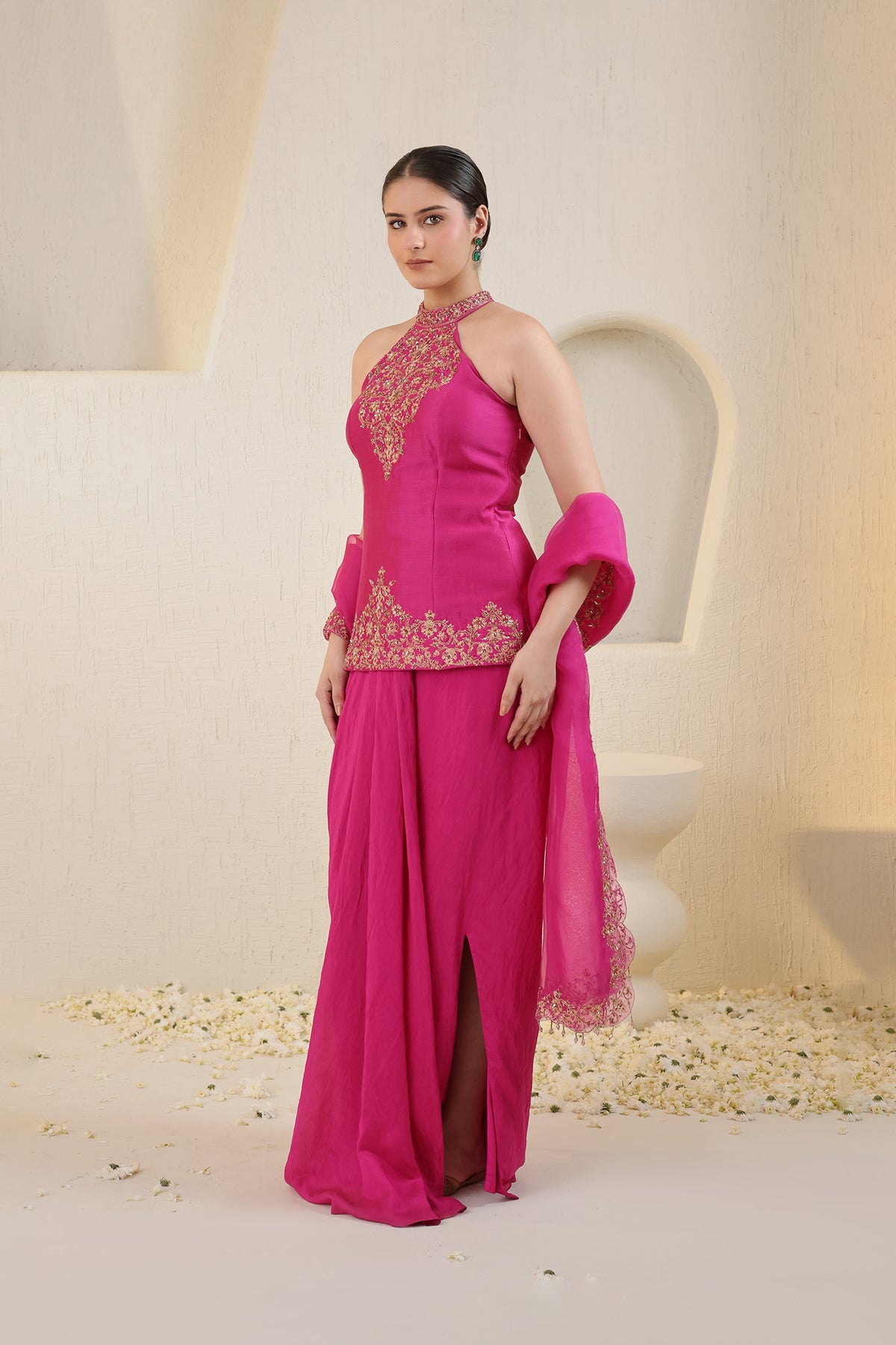 Fushia pink halter neck silk ensemble with embroidered dupatta