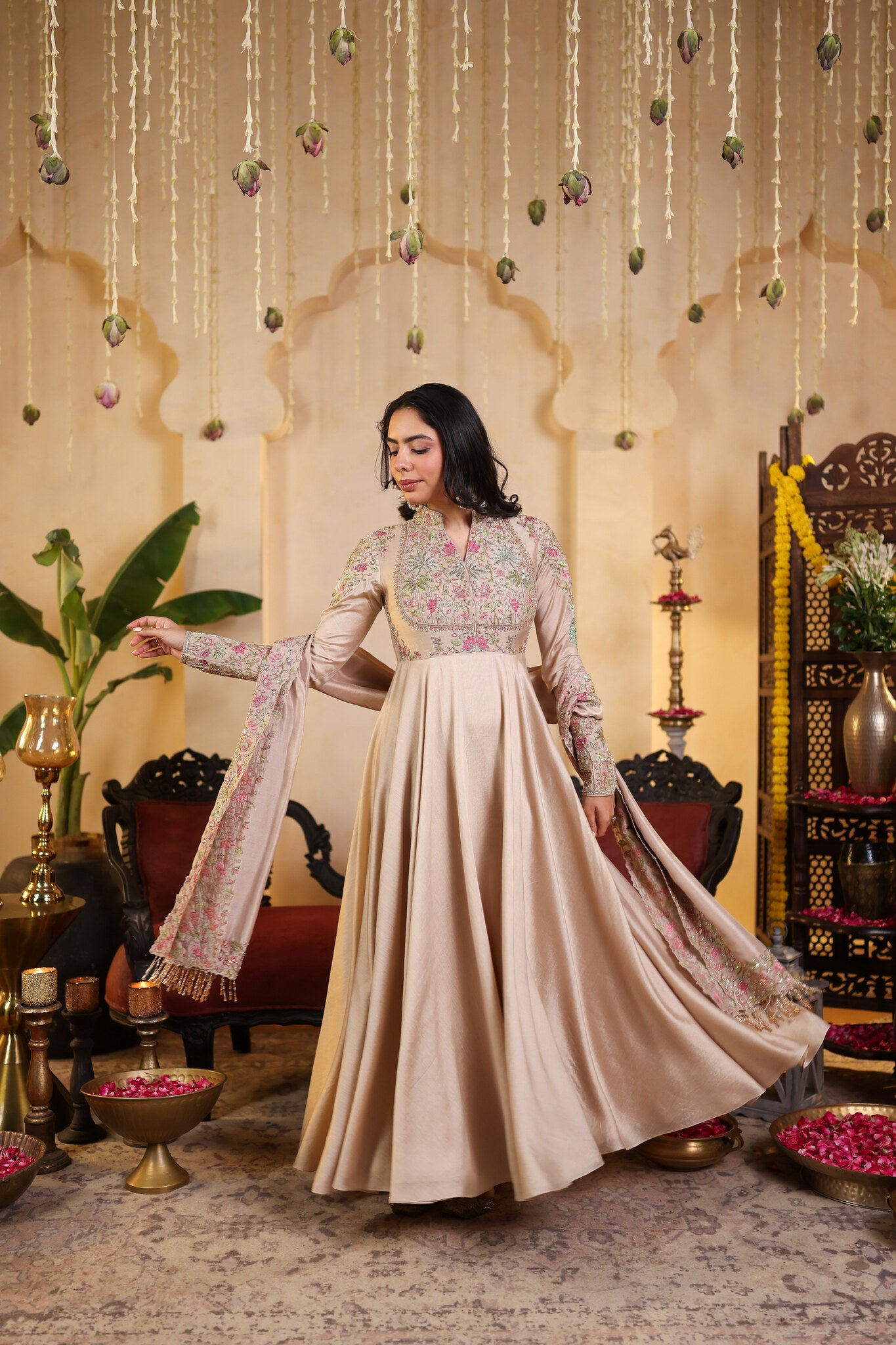 Ivory Anarkali with Pichwai Detailing — three-quarter view, in motion